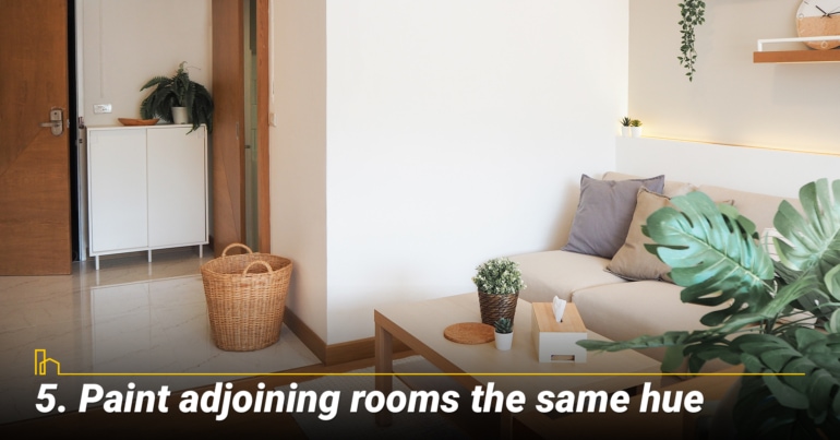 Paint adjoining rooms the same hue Paint adjoining rooms the same hue