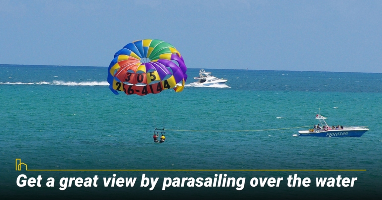 Get a great view by parasailing over the water